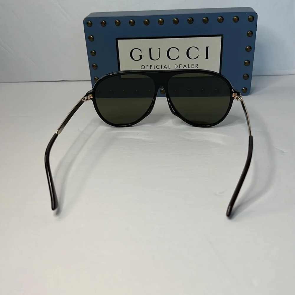 GUCCI GG0829SA 002 aviator sunglass black and ruthenium frame with green lenses.